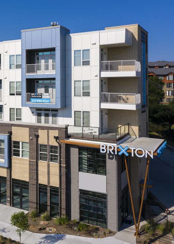an aerial view of the bxon building in the city