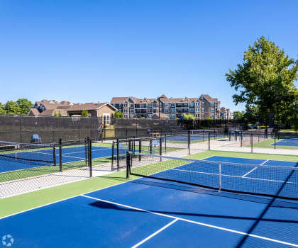 tennis courts at the resort at governors crossing  at Waterside Residences on Quivira, Kansas, 66215
