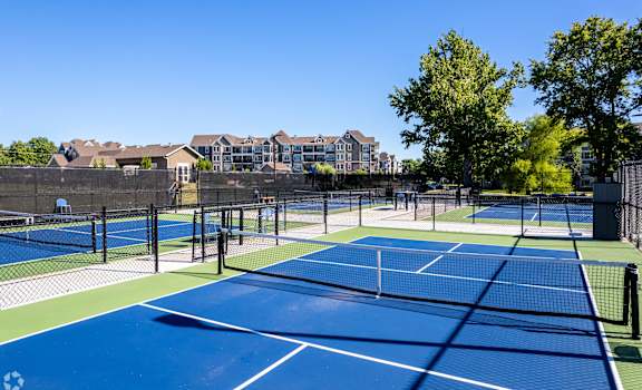tennis courts at the resort at governors crossing  at Waterside Residences on Quivira, Kansas, 66215