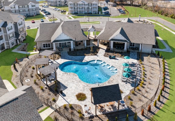Aerial view of the swimming pool, sundeck, and resident clubhouse at The Alexandria
