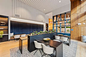 luxury kitchen with quartz countertops and tile backsplash