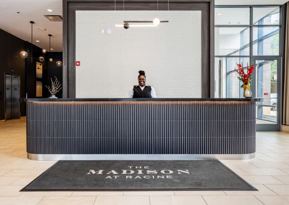 the lobby of the madison at racine hotel
