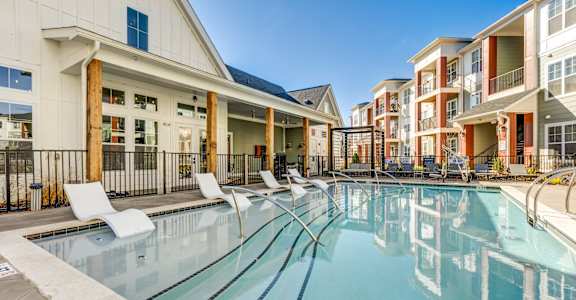 the preserve at ballantyne commons pool and apartment buildings