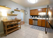 Thumbnail 20 of 49 - kitchen with stainless steal appliances