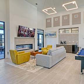 the preserve at gateway living room with pool table