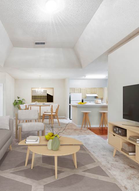 A kitchen with a sink, stove, and cabinets.