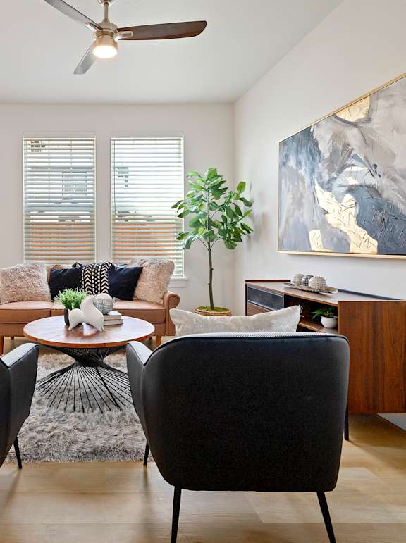 Coffee, food and a person reading book at Alante Homes at Lake Hazel, Boise, 83709