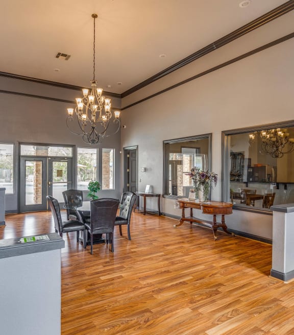 a large living room with a dining room and a kitchen