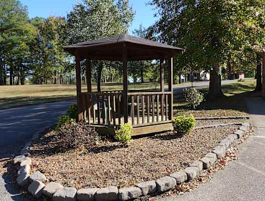 a gazebo in front of a house