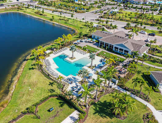 an aerial view of the pool at the resort at longboat key club