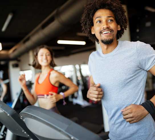 Man exercising on treadmill at Plaza at Pinnacle Hills, Rogers, AR