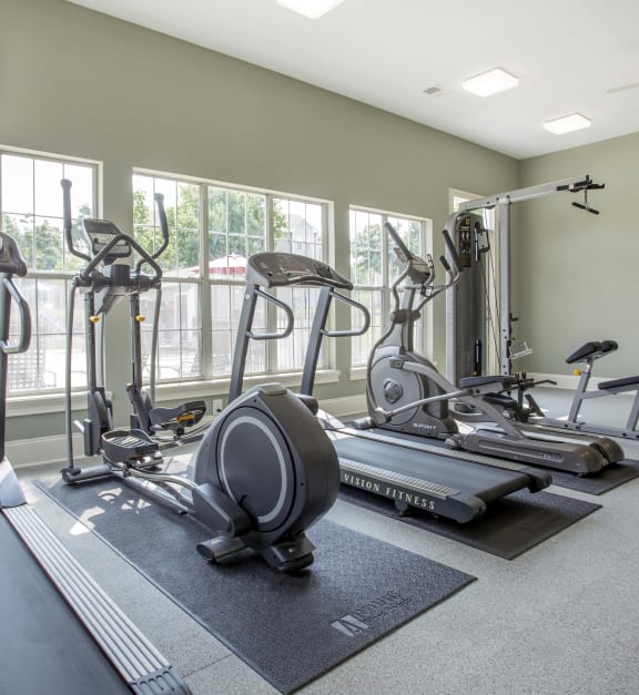 the gym is equipped with cardio equipment and state of the art equipment for fitness training at Abbington Place Apartments, North Carolina, 27407