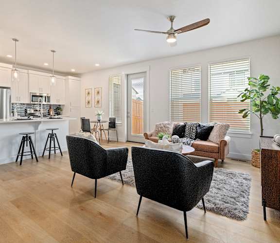 Spacious living room with kitchen at Alante Homes at Lake Hazel, Idaho