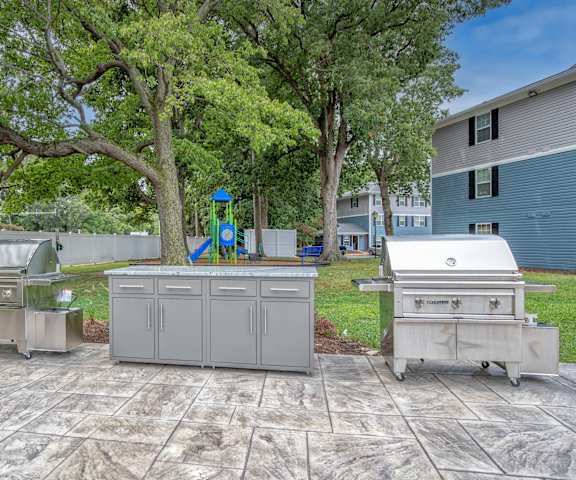 two bbq grills at the whispering winds apartments in pearland, tx