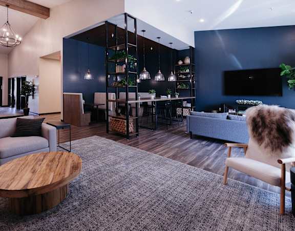 a living room with couches and a coffee table