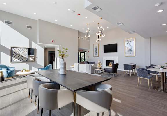 An open-concept apartment living room with modern finishes and natural light.