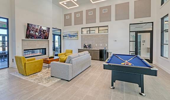 the preserve at gateway living room with pool table