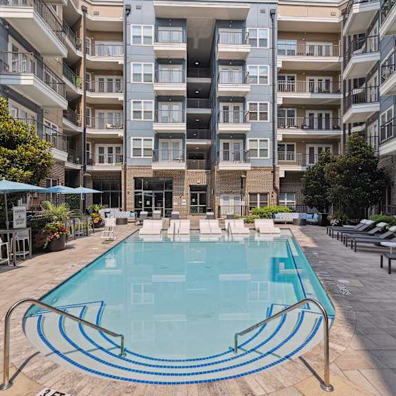 Midtown 205 Apartments in Charlotte, NC Pool with Lounge Chairs