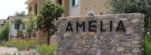a home with a sign that says america in front of it