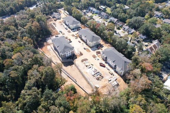 an aerial view of a neighborhood with houses under construction