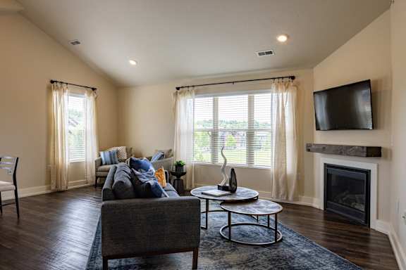 Living room at Quarry Apartments and Townhomes in DeWitt, Michigan