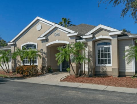 Leasing office exterior with native landscaping