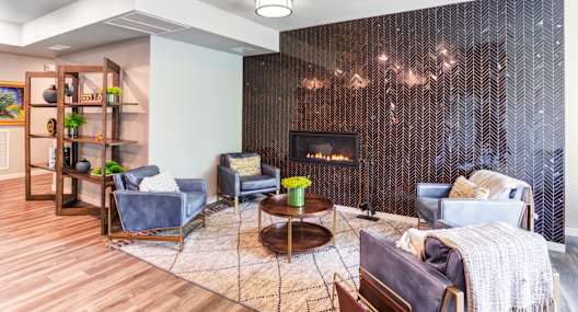 the living room at the heights at harper's preserve apartments in conroe, tx