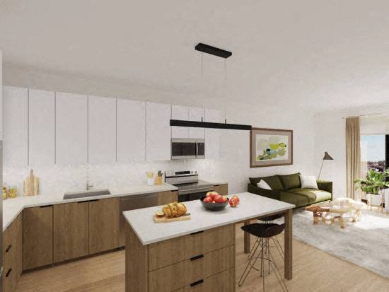 a kitchen and living room with a white counter top