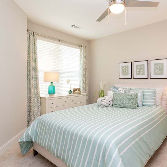 Primary Bedroom at Leland Station Apartments, Leland, NC, 28451