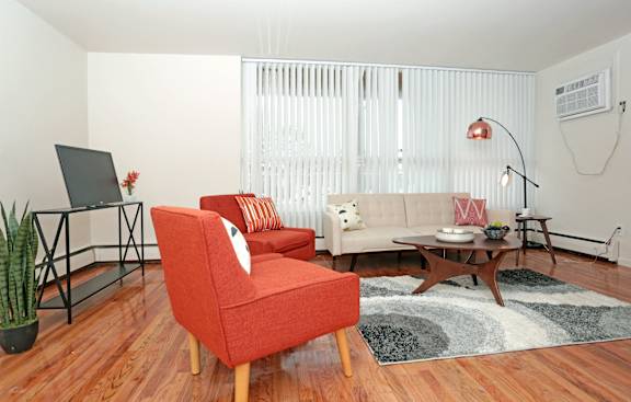 a living room with a couch and a chair