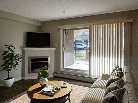 a living room with a couch and a table