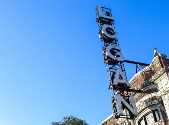 a sign that is on the side of a building