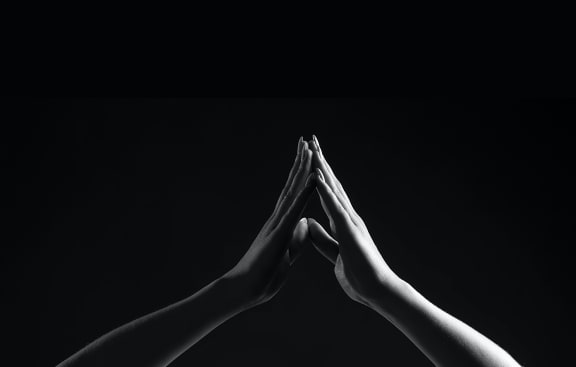 Hands coming together  at The Verandas, Canoga Park, California