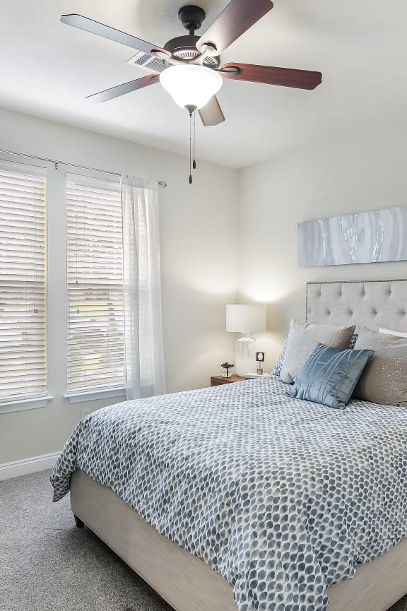 a home office with a desk and a window at Charleston Apartment Homes, Mobile, AL 36695