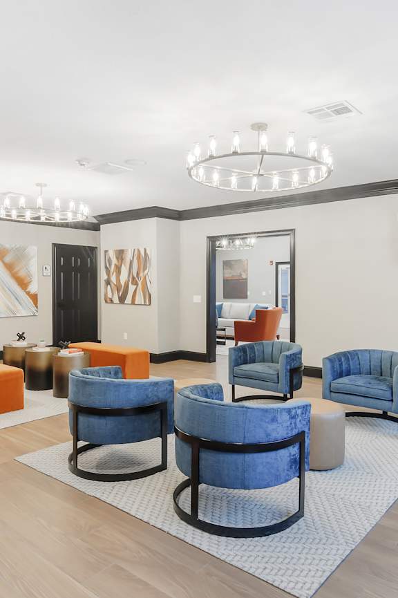 a home office with a desk and a window  at The Woodlands Apartment Homes, Meridian, Mississippi, 39301