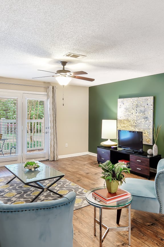 a home office with a desk and a window at Avalon Apartment Homes, Starkville