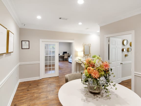 a living room with a couch and a tv  at Parklane Apartment Homes, McComb