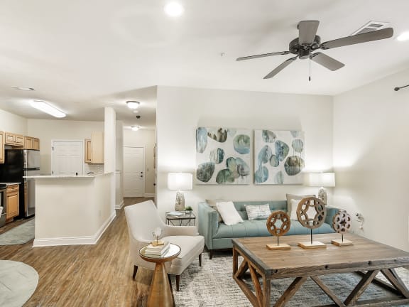 living room with kitchen at Charleston Apartment Homes, Alabama 36695