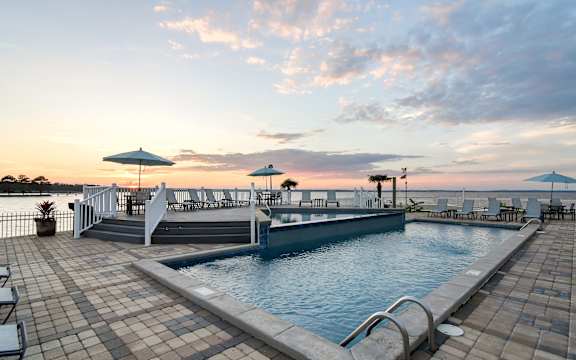 the swimming pool at the resort at longboat key club