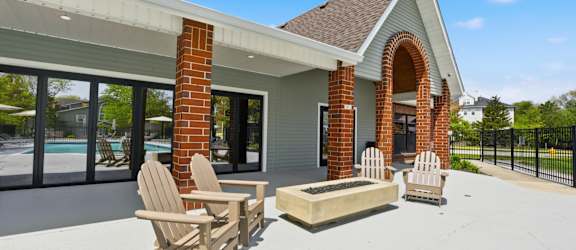 A house with a patio and a fireplace.