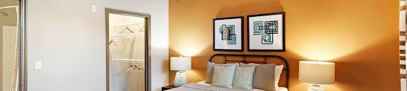 a bedroom with a bed and a ceiling fan at Audubon Park Apartment Homes, Zachary, LA 70791