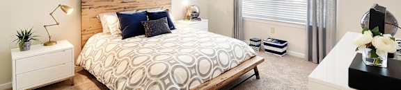 a bedroom with a bed and a ceiling fan at Landing at Willow Bayou in Bossier City Louisiana
