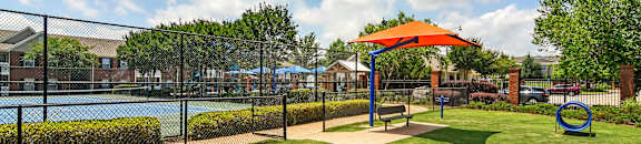 the preserve at ballantyne commons park with playground and pool at Bridgewater Apartment Homes, Brandon, MS