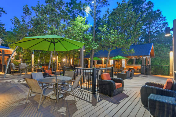an open kitchen and dining room with a table and chairs  at Lagniappe of Biloxi Apartment Homes, Biloxi, MS, 39532