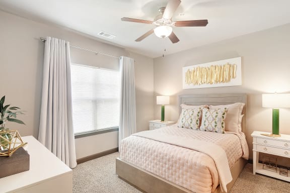 a rendering of a living room with a kitchen in the background  at Kingston Crossing Apartment Homes, Bossier City, LA