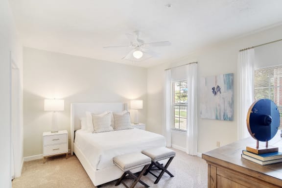 a rendering of a living room with a kitchen in the background at Summit of Shreveport Apartment Homes, Shreveport, 71105