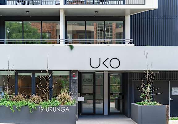 the facade of a building with the logo on it