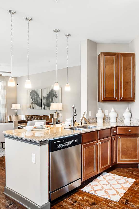 a home office with a desk and a window  at Wellington Grande Apartment Homes, Longview, TX