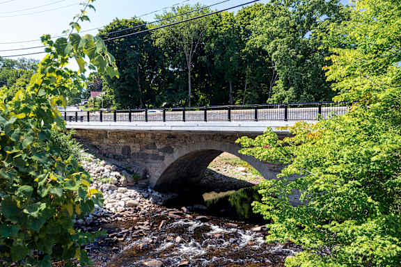 a bridge over a river with a road on top of it