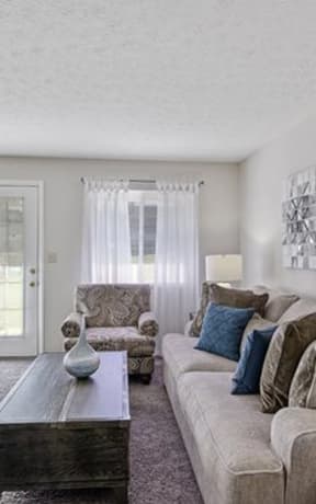 a living room with a couch and a coffee table at Enclave, Beavercreek, OH, 45431